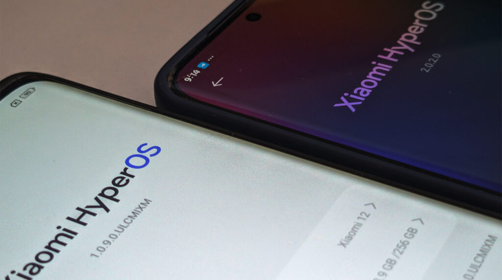 Uma imagem em close-up de dois smartphones, um com uma tela branca e outro com uma tela escura, ambos exibindo a interface 