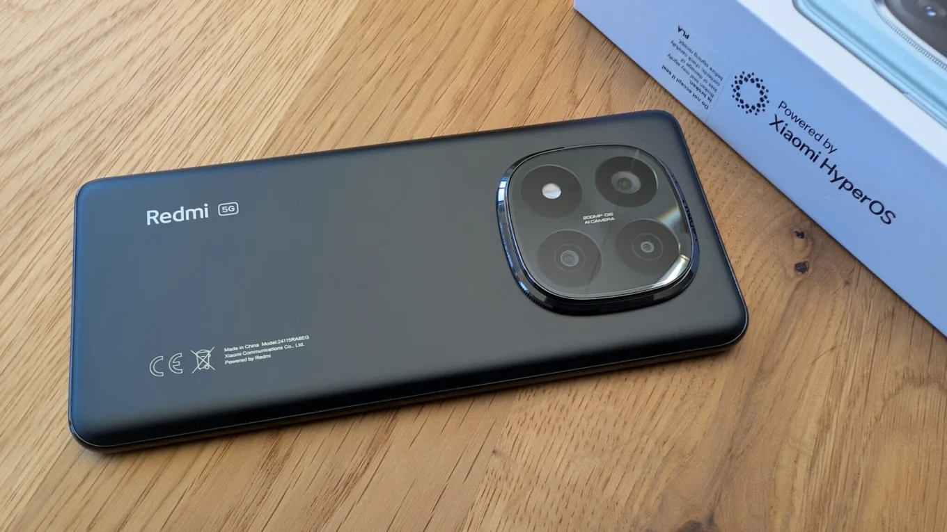 Redmi Note 14 Pro+ 5G com sistema HyperOS 2.2 Global, exibindo a parte traseira do celular e a caixa do produto.