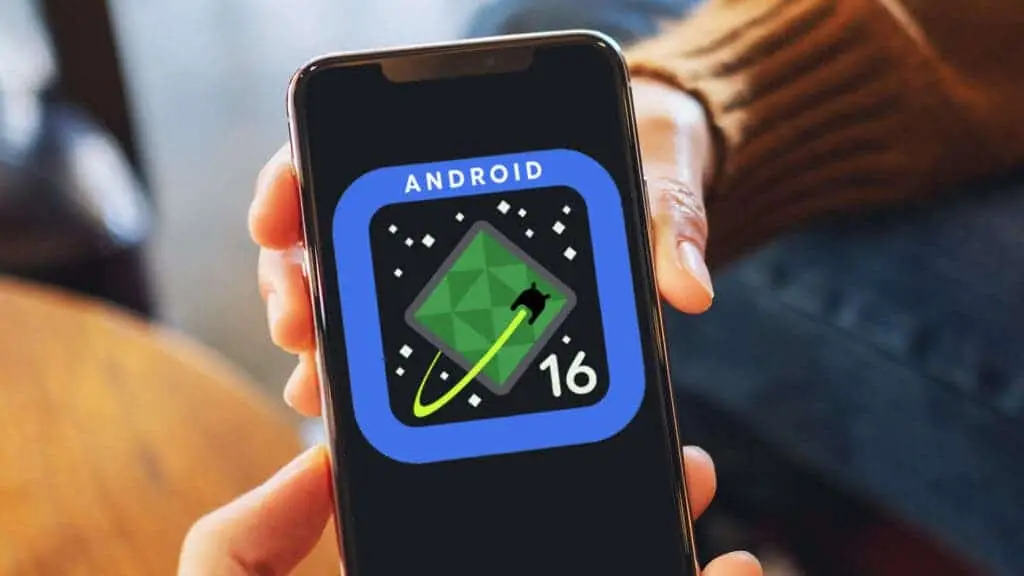 Smartphone exibindo na tela o logo do Android 16 em um fundo escuro, com um ícone estilizado de uma estrela-cadente em um quadrado com borda azul.